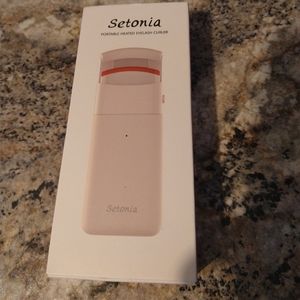 Electric eyelash curler